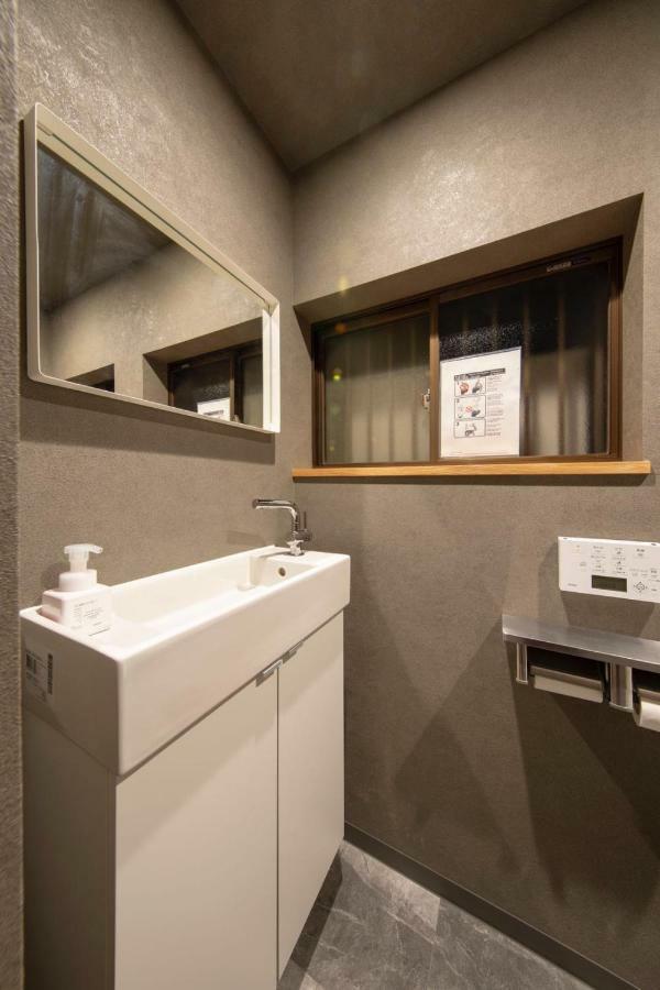 Sano-San-Chi Waraku Apartment Izumisano Bagian luar foto