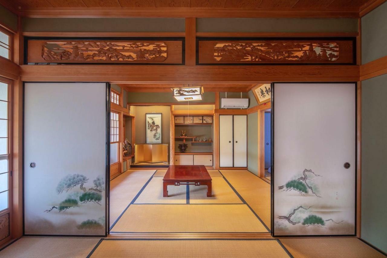Sano-San-Chi Waraku Apartment Izumisano Bagian luar foto