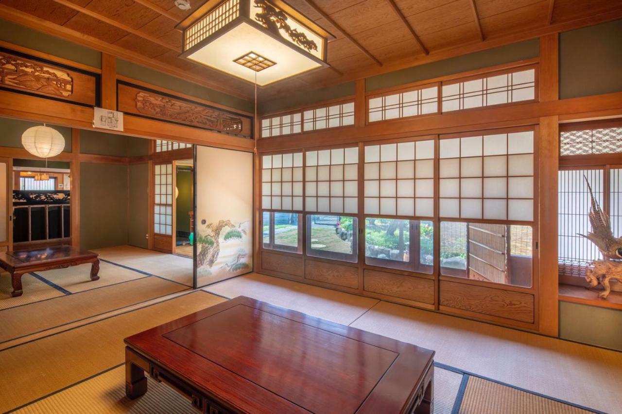 Sano-San-Chi Waraku Apartment Izumisano Bagian luar foto