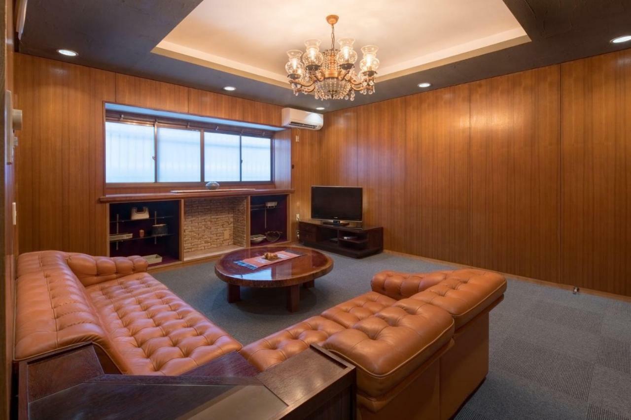 Sano-San-Chi Waraku Apartment Izumisano Bagian luar foto