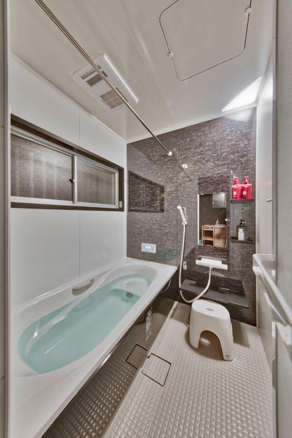 Sano-San-Chi Waraku Apartment Izumisano Bagian luar foto